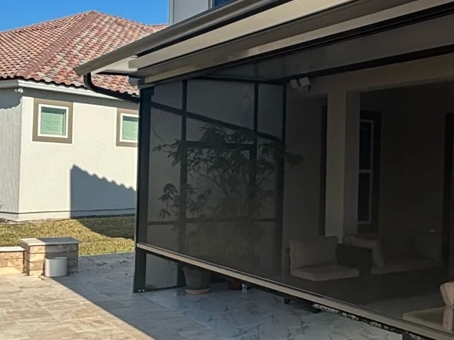 Composite roof with rolldown screen system