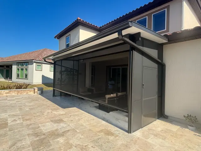 Composite roof with rolldown screen system